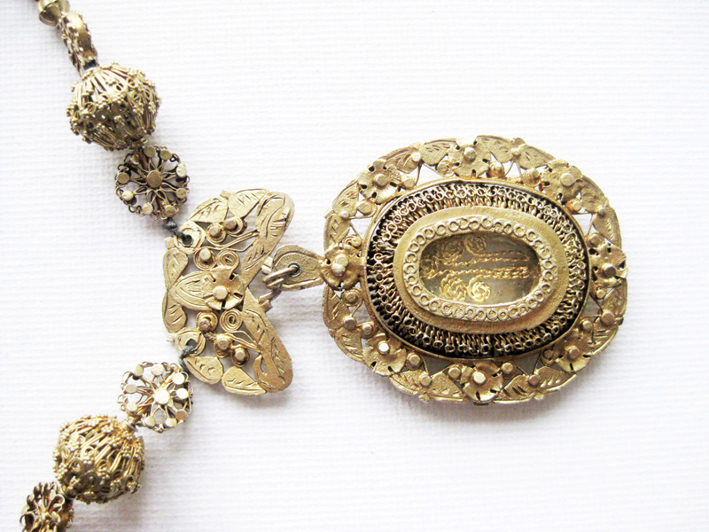 Big ornate silver dipped in gold tamborin necklace
